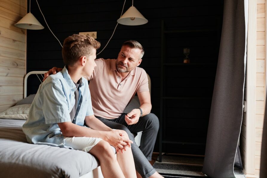 dad talking to son about different high school options