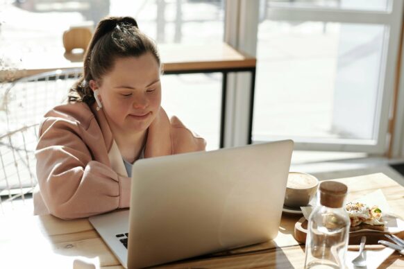 student in front of laptop