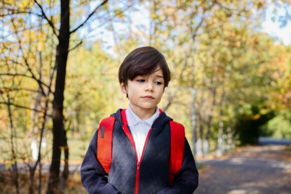 young boy looking sad