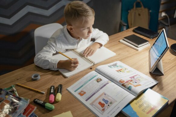 student doing some work for virtual elementary school