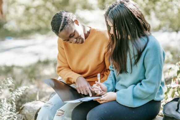 two students doing homework together